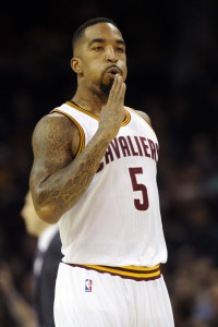 Jan 23, 2015; Cleveland, OH, USA; Cleveland Cavaliers guard J.R.  Smith (5) reacts after hitting a three-point shot against the Charlotte Hornets during the first quarter at Quicken Loans Arena. Mandatory Credit: Ken Blaze-USA TODAY Sports
