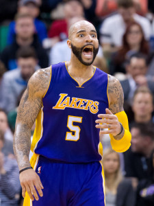 Feb 25, 2015; Salt Lake City, UT, USA; Los Angeles Lakers forward Carlos Boozer (5) reacts during the second half against the Utah Jazz at EnergySolutions Arena. The Lakers won 100-97. Mandatory Credit: Russ Isabella-USA TODAY Sports