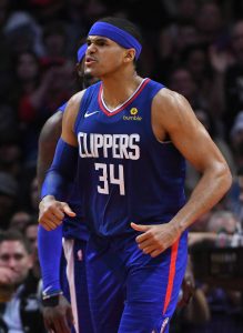 Tobias Harris and Boban Marjanovic of the LA Clippers exchange